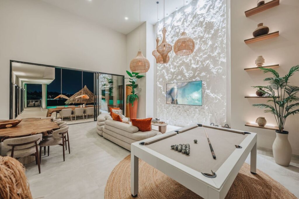 Villa Alma open-plan living room with billiards table
